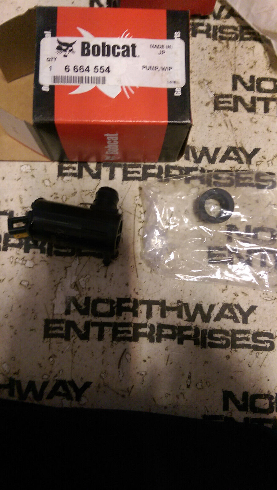 BOBCAT 6664554 WINDOW WASHER PUMP