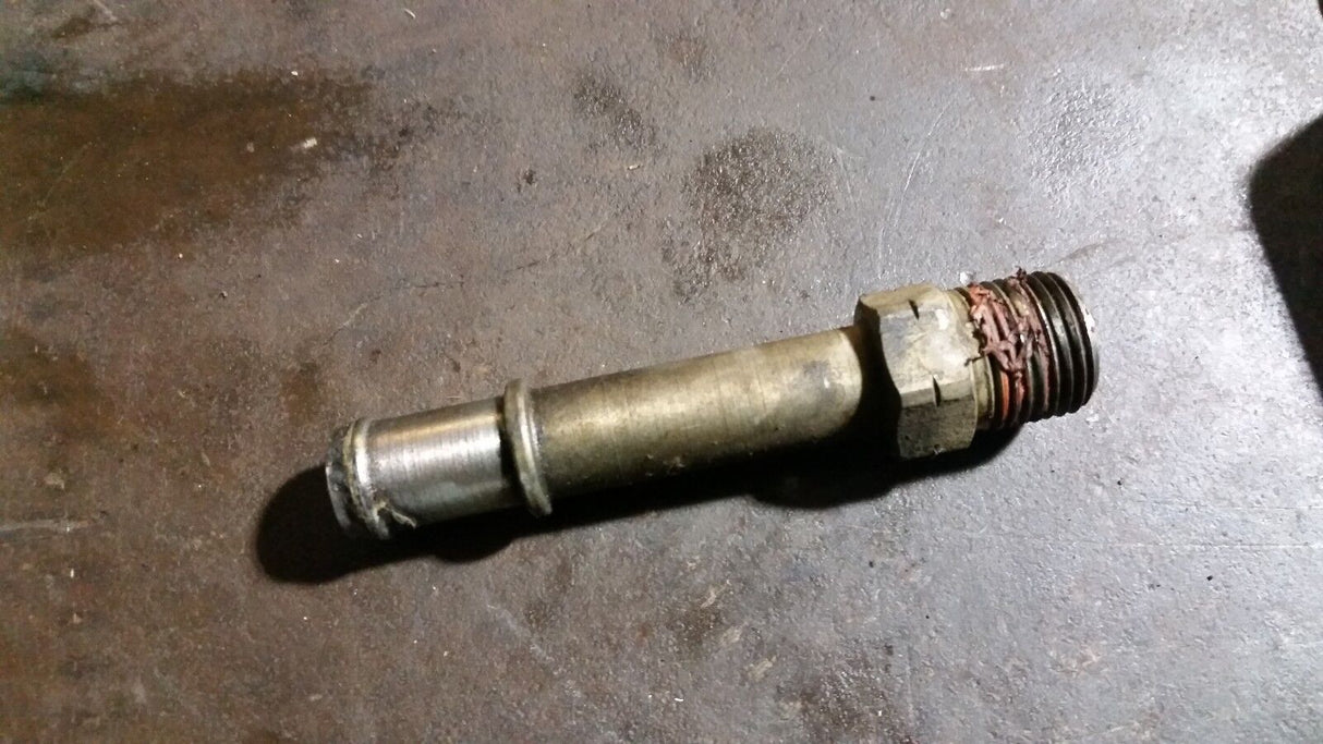 5.9L 5.9 Cummins Coolant head pipe spout spigot 5093491AB