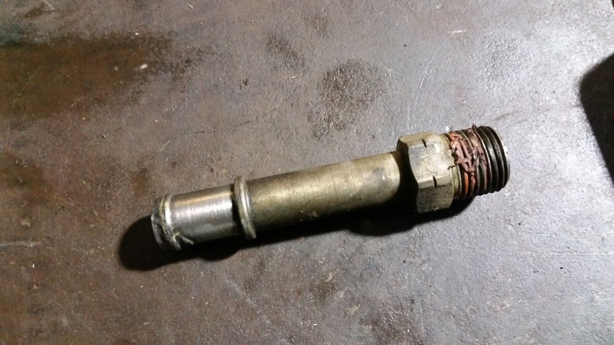 5.9L 5.9 Cummins Coolant head pipe spout spigot 5093491AB