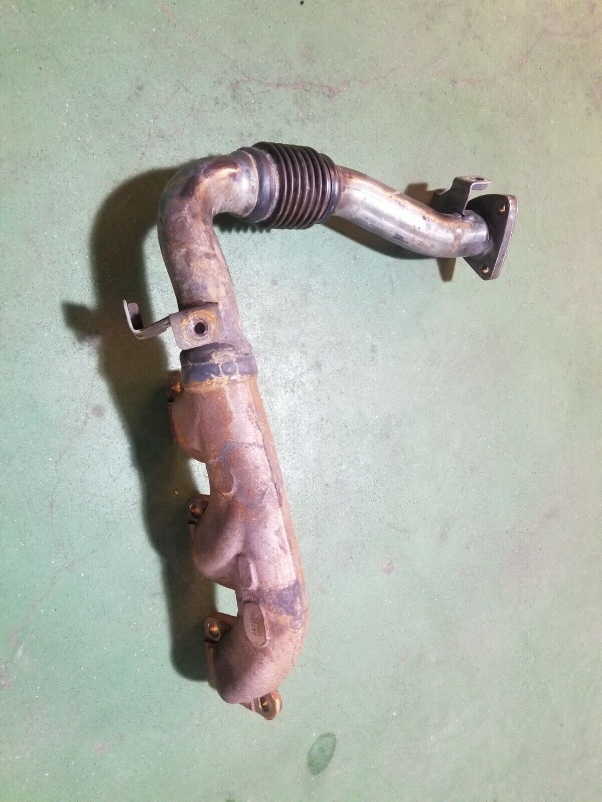 68245730AB 3.0L ECODIESEL USED EXHAUST MANIFOLD LEFT DRIVERS SIDE