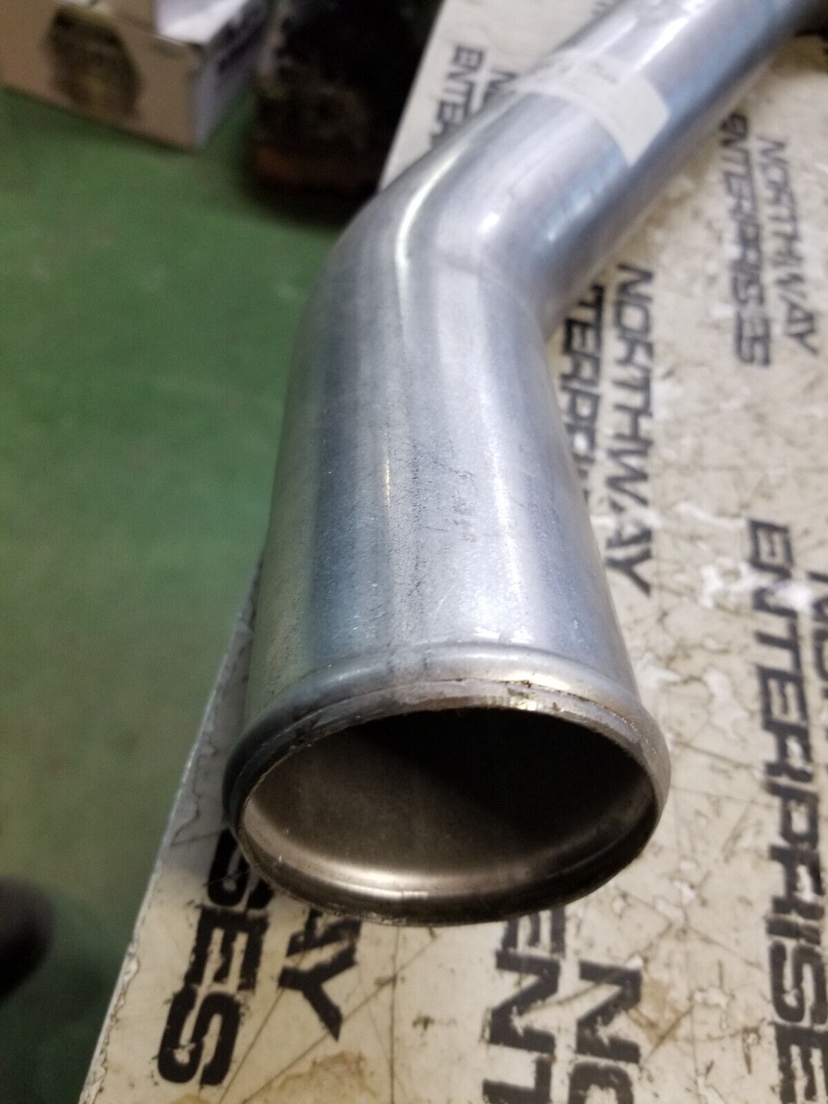 1001117940 JLG pipe,cac outlet