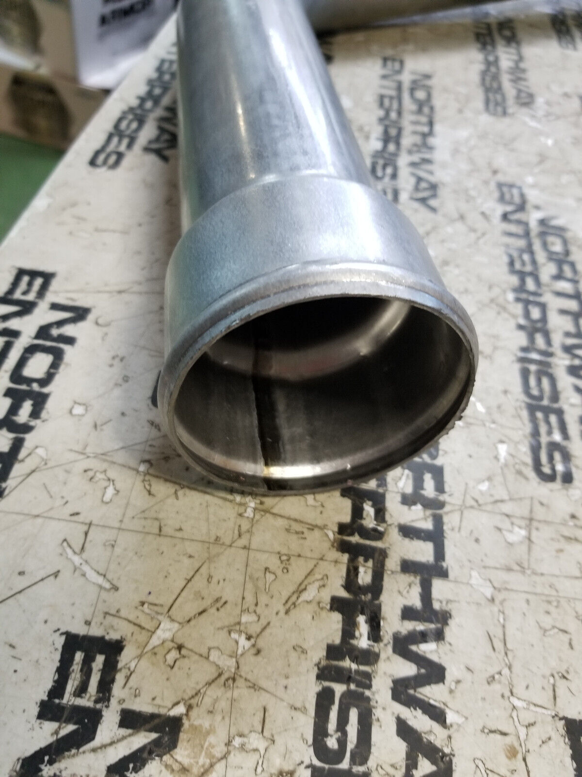 1001117940 JLG pipe,cac outlet