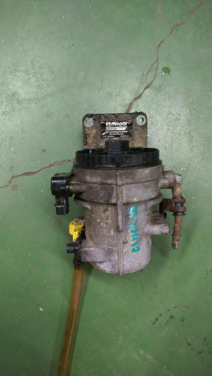 2005-2007 CUMMINS DODGE 5.9 5.9L FUEL FILTER HOUSING 05015581AA 3964851 r5904