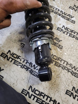 AM137814 JOHN DEERE Gator 825i 10 Shock Rear